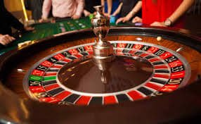 Live casino dealer table with multiple camera angles